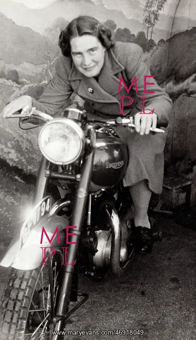 : Lady on a 1948 Triumph motorcycle : Lady on a 1948 Triumph motorcycle
