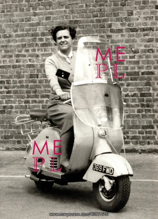 : Lady on 1950s scooter : Lady on 1950s scooter