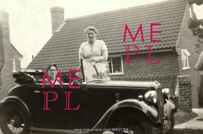 : Lady driver in tiny Austin 7 Opal : Lady driver in tiny Austin 7 Opal