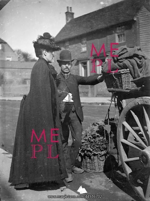 : Lady at greengrocer's cart : Lady at greengrocer's cart