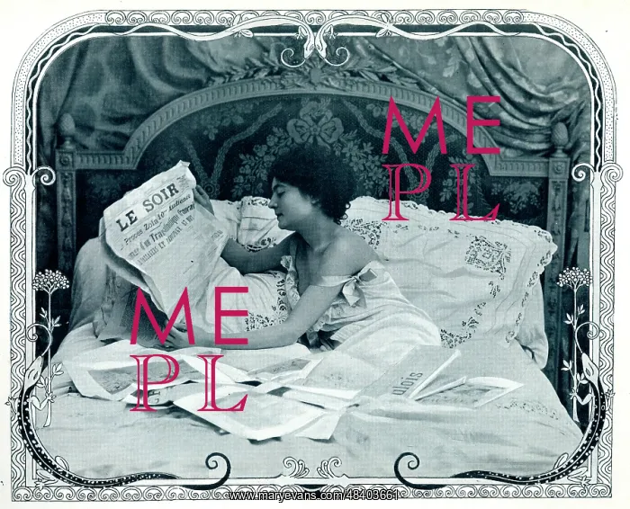  : Lady reading the newspaper in bed