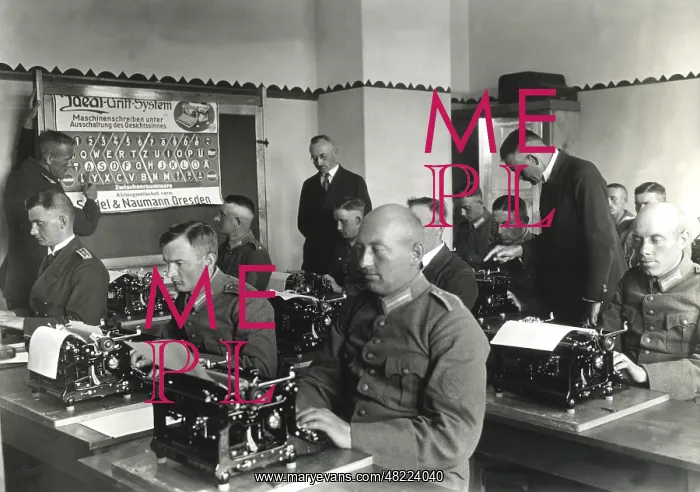 : Lance corporals at typewriters : Lance corporals at typewriters