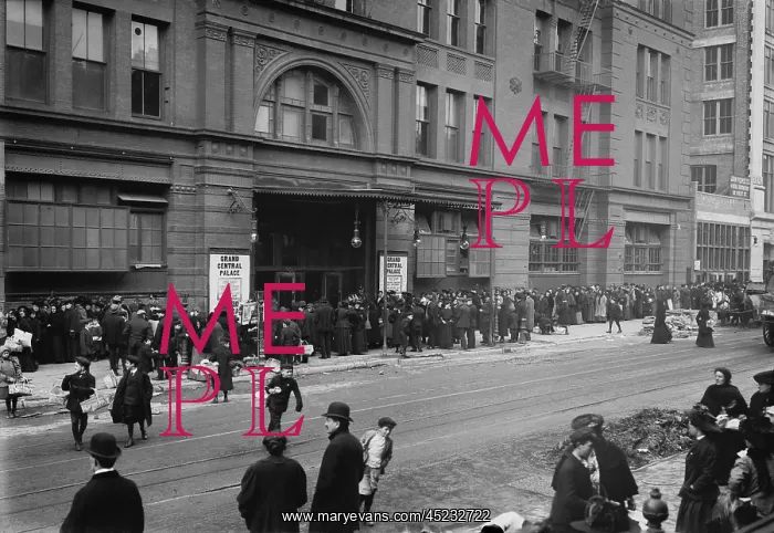 : A large crowd of men and women wait outside ? : A large crowd of men and women wait outside ?