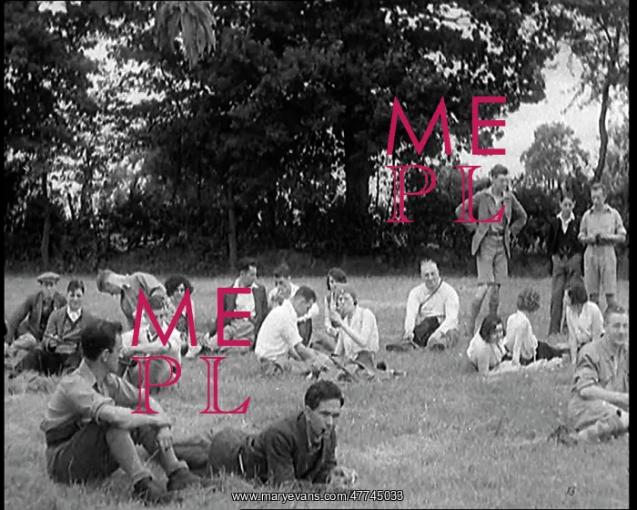 : A Large Group of Hikers Having Drinks in a Field : A Large Group of Hikers Having Drinks in a Field