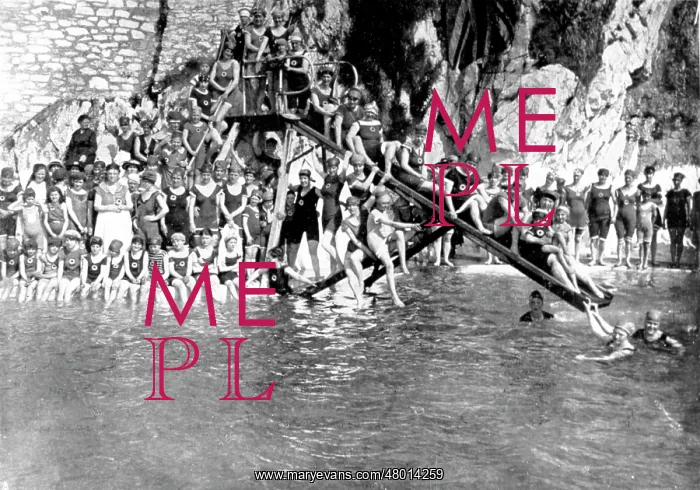  : Large group of swimmers with water chute