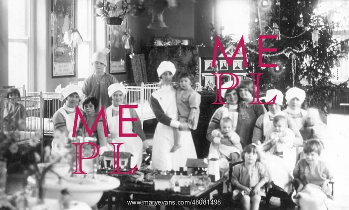 : Large informal group of nurses and children, Christmas : Large informal group of nurses and children, Christmas