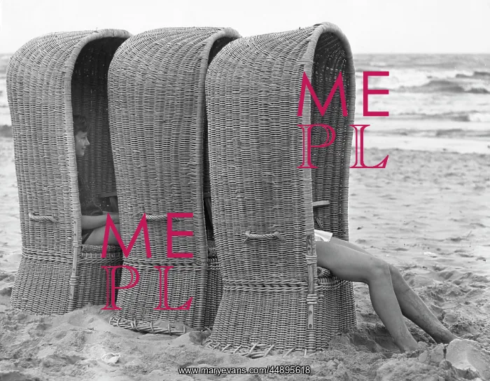 : Three large woven beach chairs at the seaside : Three large woven beach chairs at the seaside