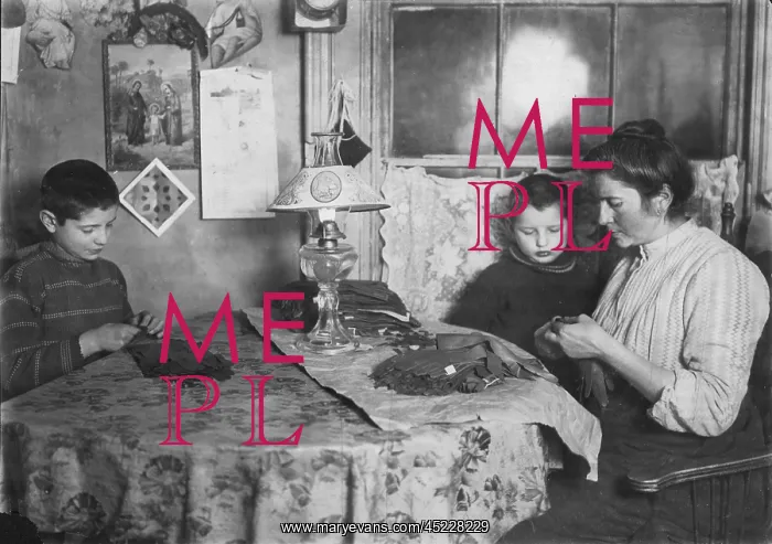 : Late at night, sewing tapes on gloves. The ? : Late at night, sewing tapes on gloves. The ?