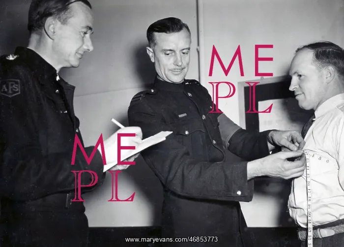 : LCC-LFB AFS volunteer measured for uniform, WW2 : LCC-LFB AFS volunteer measured for uniform, WW2