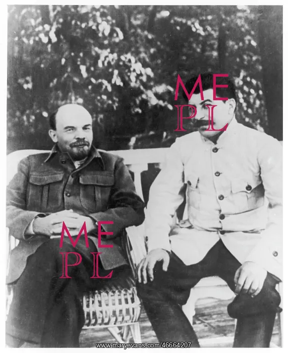 : Lenin and Stalin sitting on a bench : Lenin and Stalin sitting on a bench