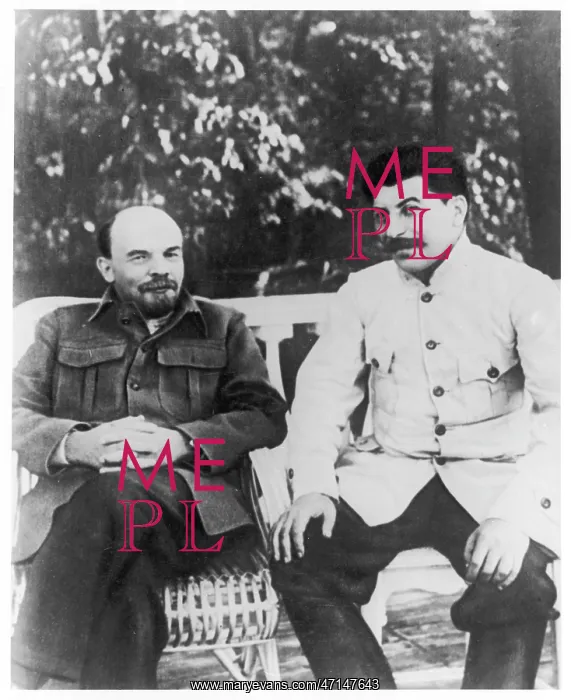 : Lenin and Stalin sitting on a bench : Lenin and Stalin sitting on a bench