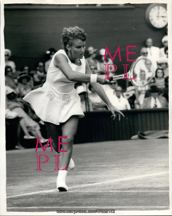 : Lesley Turner in tennis match at Wimbledon : Lesley Turner in tennis match at Wimbledon