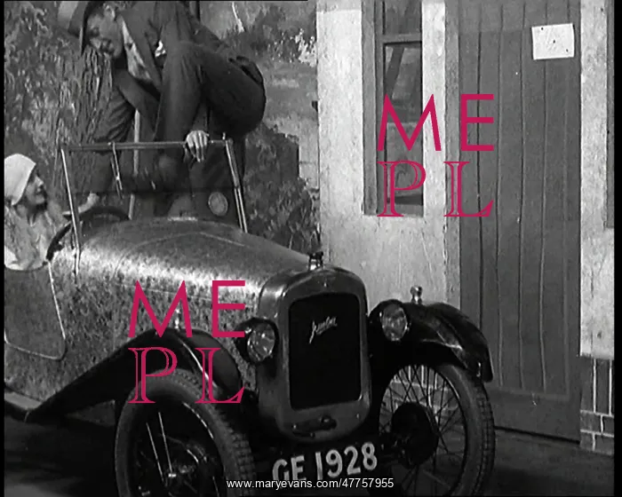 : Leslie Henson Climbing Into a Car And Getting : Leslie Henson Climbing Into a Car And Getting
