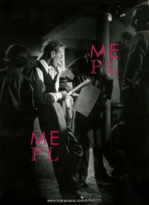 : Leslie Howard concentrating on his lines : Leslie Howard concentrating on his lines