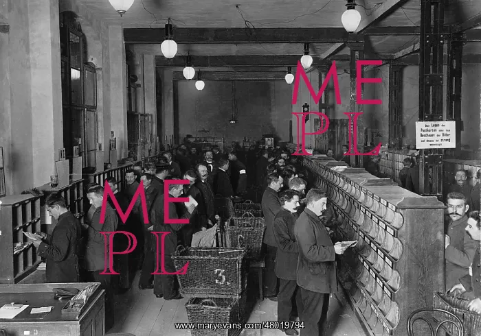 : Letter sorter in Berlin's Main Post Office, 1908 : Letter sorter in Berlin's Main Post Office, 1908