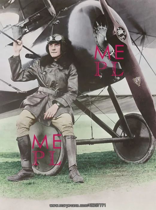 : Lieutenant Earl Carroll seated on the wheel : Lieutenant Earl Carroll seated on the wheel