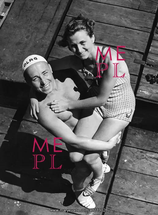 : A lifeguard posing with a female swimmer, 1939 : A lifeguard posing with a female swimmer, 1939