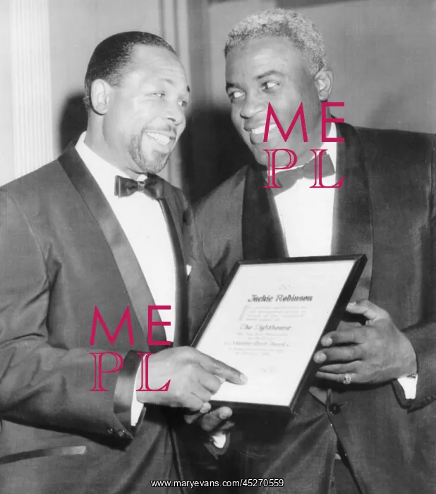 : Light heavyweight champion Archie Moore talks with : Light heavyweight champion Archie Moore talks with