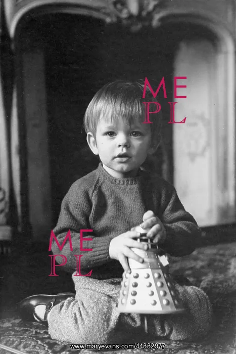 : Little boy with a Dalek toy : Little boy with a Dalek toy