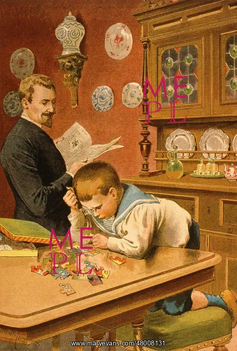: Little boy doing a jigsaw puzzle : Little boy doing a jigsaw puzzle