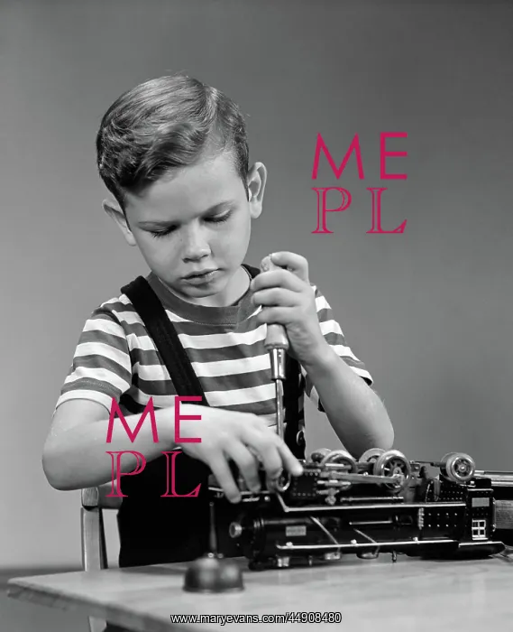 : Little boy fixing lionel electric toy train engine : Little boy fixing lionel electric toy train engine