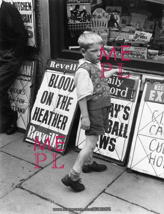 : Little boy outside an Edinburgh shop : Little boy outside an Edinburgh shop