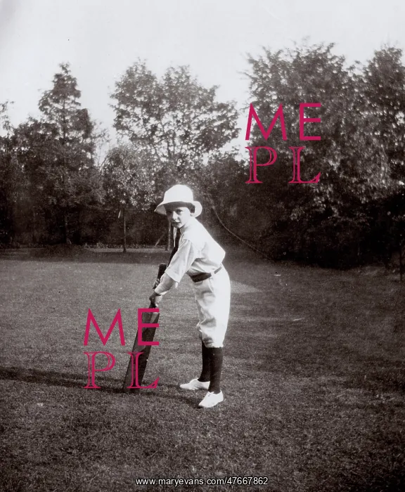 : Little boy practising cricket in garden, Ealing, West London : Little boy practising cricket in garden, Ealing, West London