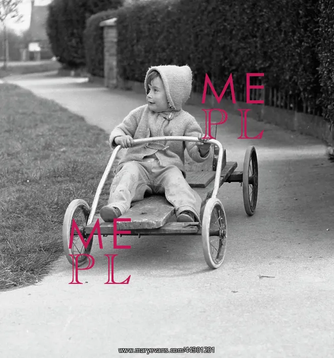 : Little boy riding on a go-kart : Little boy riding on a go-kart