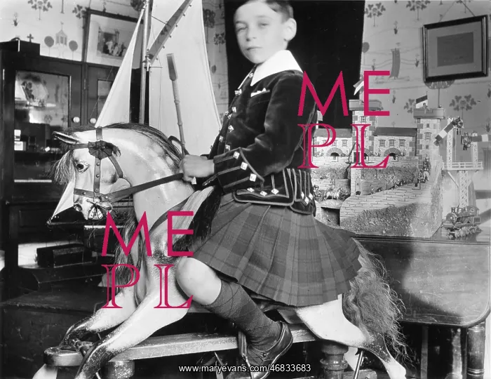 : Little boy on rocking horse : Little boy on rocking horse