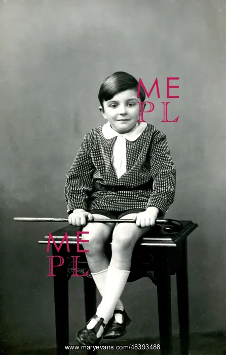: Little boy sitting on a stool : Little boy sitting on a stool