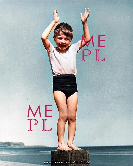 : Little boy standing on a wooden post at the seaside : Little boy standing on a wooden post at the seaside