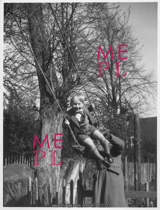  : Little boy on a swing