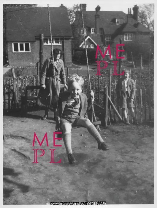 : Little boy on a swing : Little boy on a swing