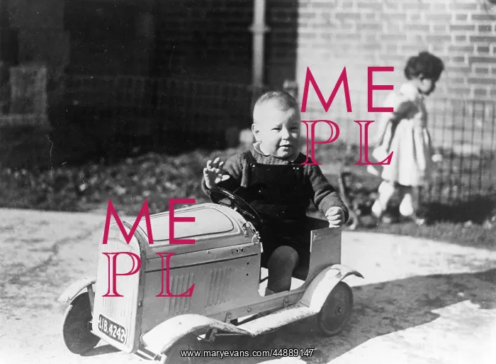 : Little boy in a toy car : Little boy in a toy car