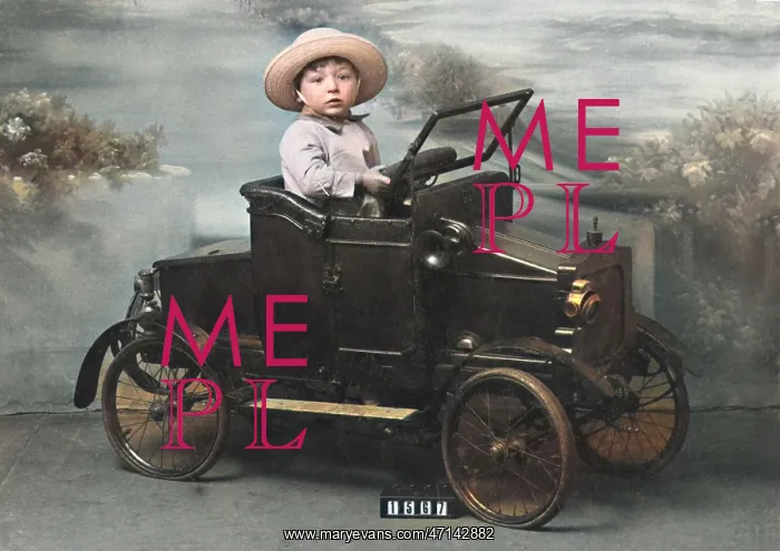 : Little boy in toy car in studio portrait : Little boy in toy car in studio portrait