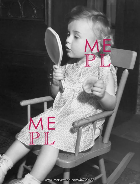 : Little girl looking in mirror : Little girl looking in mirror