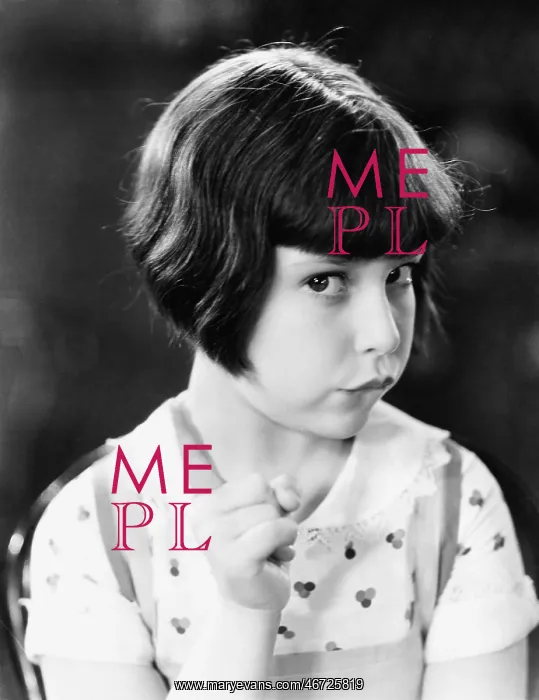: Little girl looking mischievous : Little girl looking mischievous