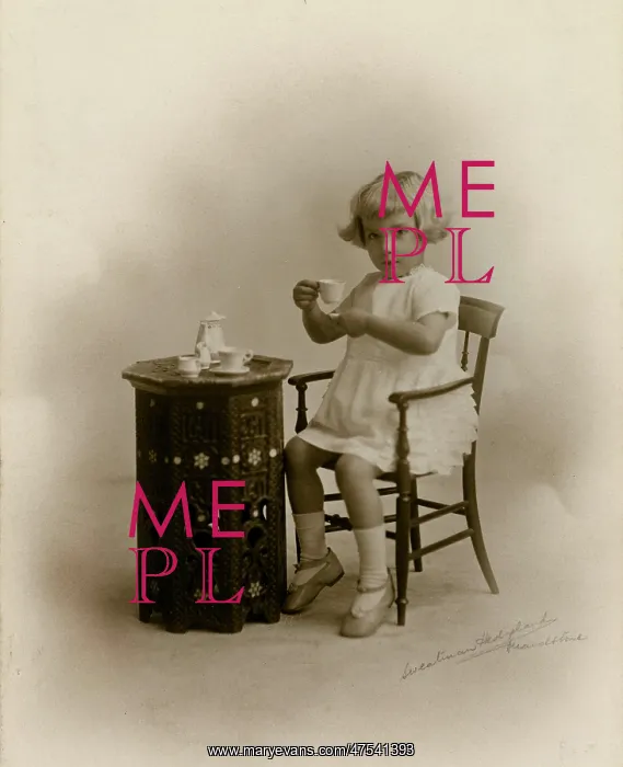 : Little girl with miniature tea set : Little girl with miniature tea set