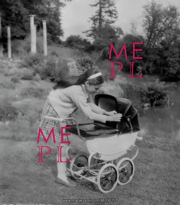 : Little girl with her pram : Little girl with her pram