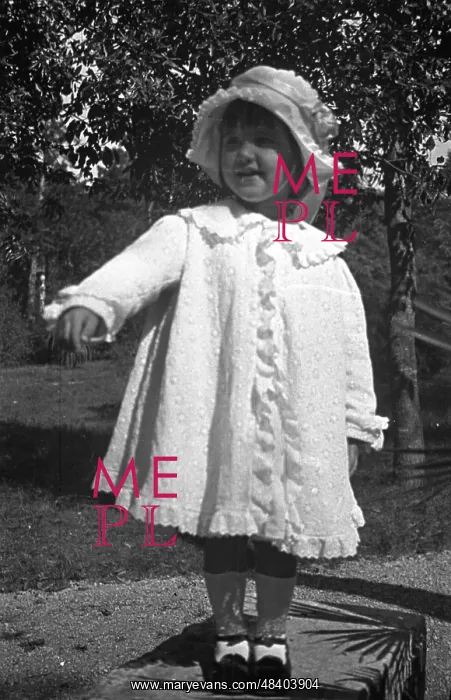  : Little girl in a white coat