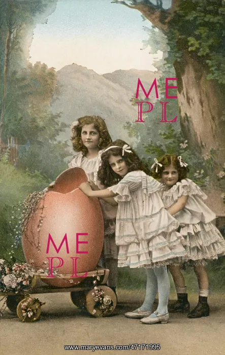 : Three little girls with a large Easter egg on a trolley : Three little girls with a large Easter egg on a trolley
