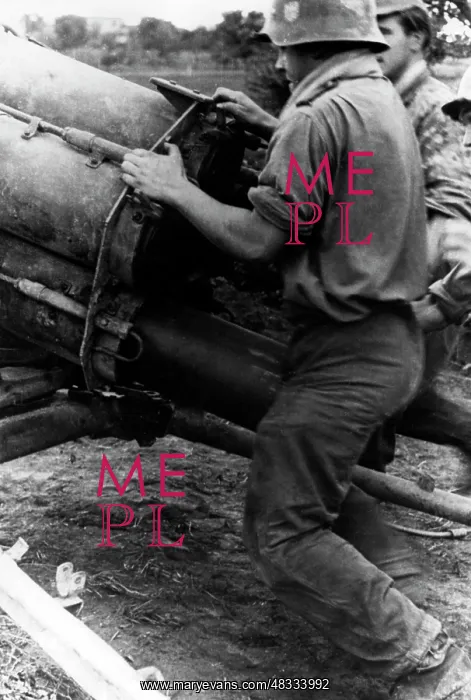 : Loading a smoke launcher on the Eastern Front, 1944 : Loading a smoke launcher on the Eastern Front, 1944