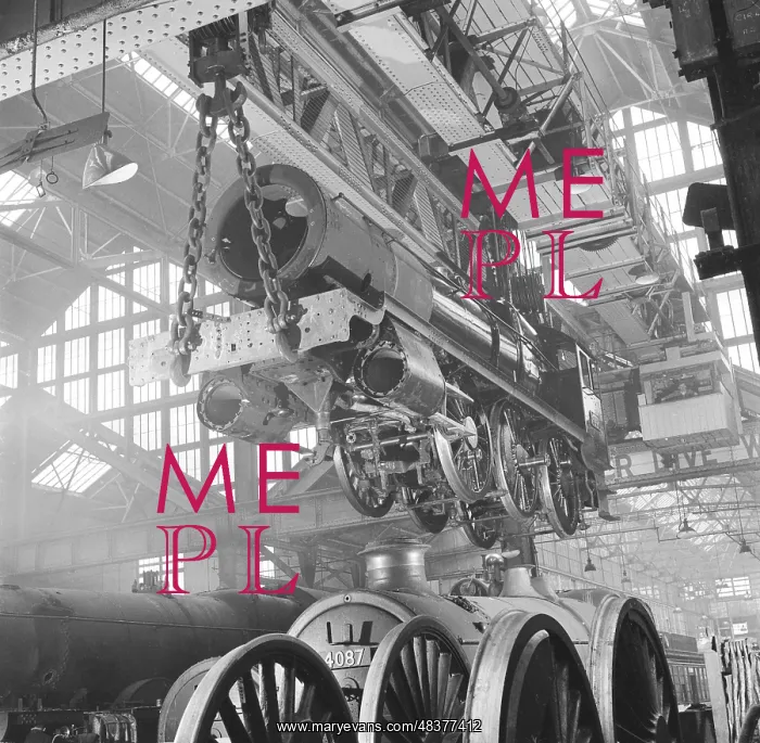 : Locomotive construction in a large railway shed : Locomotive construction in a large railway shed