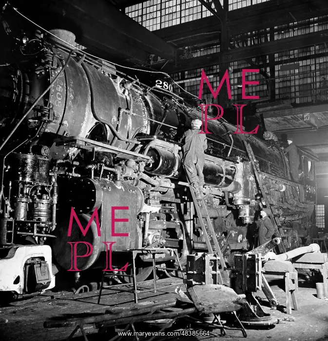: A locomotive being repaired at the Chicago and : A locomotive being repaired at the Chicago and