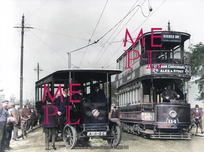 : A London tram overtaking a trolleybus : A London tram overtaking a trolleybus
