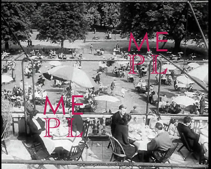 : Looking Down on the Roof Terrace of a Busy : Looking Down on the Roof Terrace of a Busy