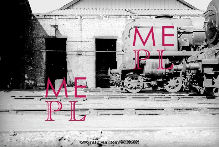 : Looking across tracks at smoke box of steam engine : Looking across tracks at smoke box of steam engine