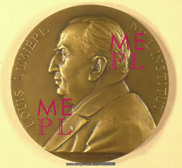 : Louis Lumiere portrait on a coin : Louis Lumiere portrait on a coin