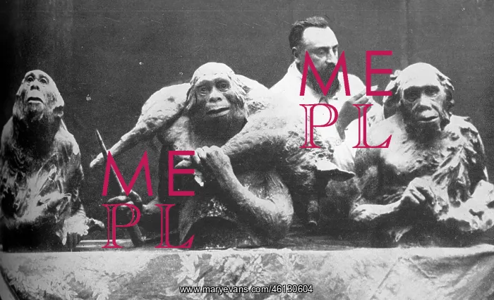 : Louis Mascre with sculptures of evolutionary man : Louis Mascre with sculptures of evolutionary man