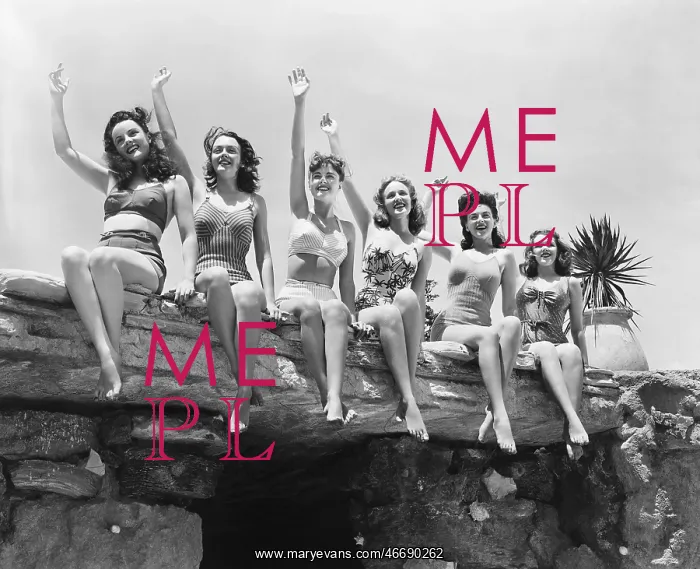 : Low angle view of a group of women sitting on a : Low angle view of a group of women sitting on a